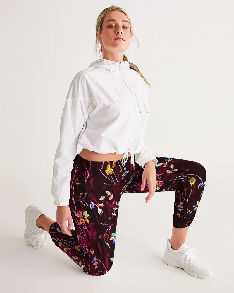 Active wear women's track pants or gym pants. Boho jogging or pants and streetwear. From Artikrti.