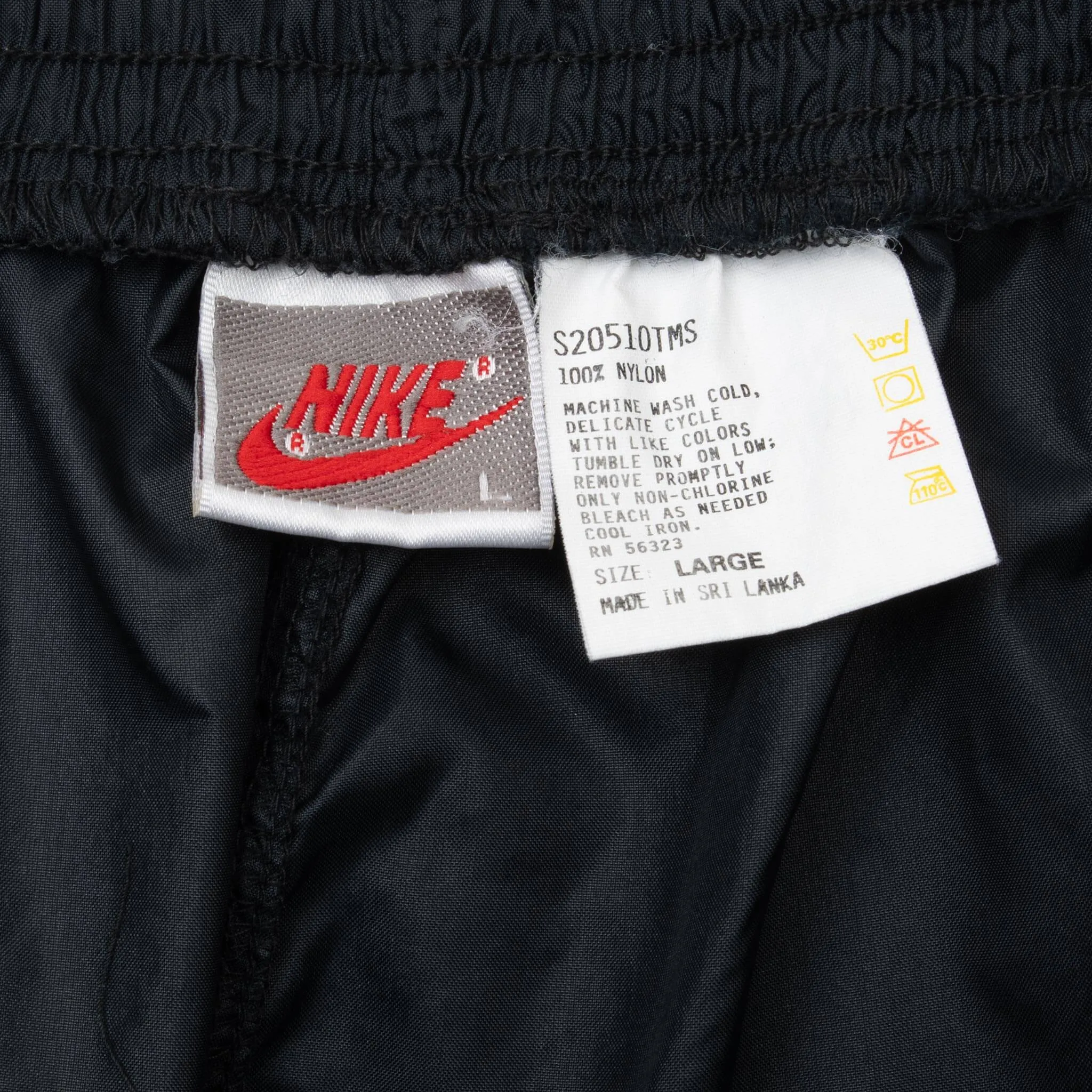 VINTAGE NIKE CLASSIC SWOOSH BLACK NYLON TRACK PANTS EARLY 1990S LARGE